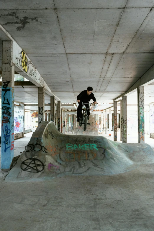 a man riding a skateboard up the side of a ramp