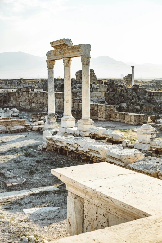 an ancient monument surrounded by stone in the middle of nowhere