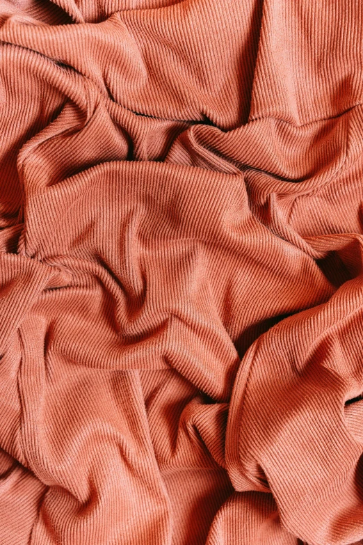 a close up of the top of a red cloth