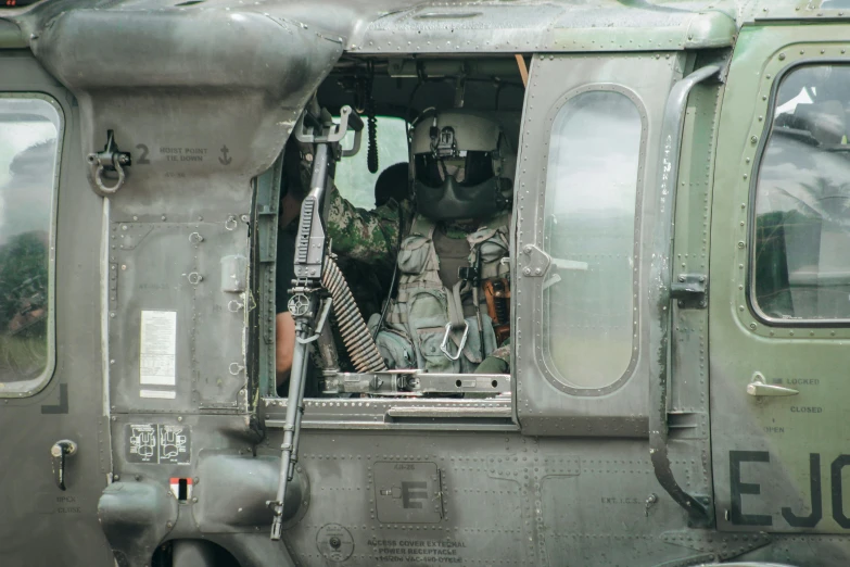 the door of the military vehicle has many pictures