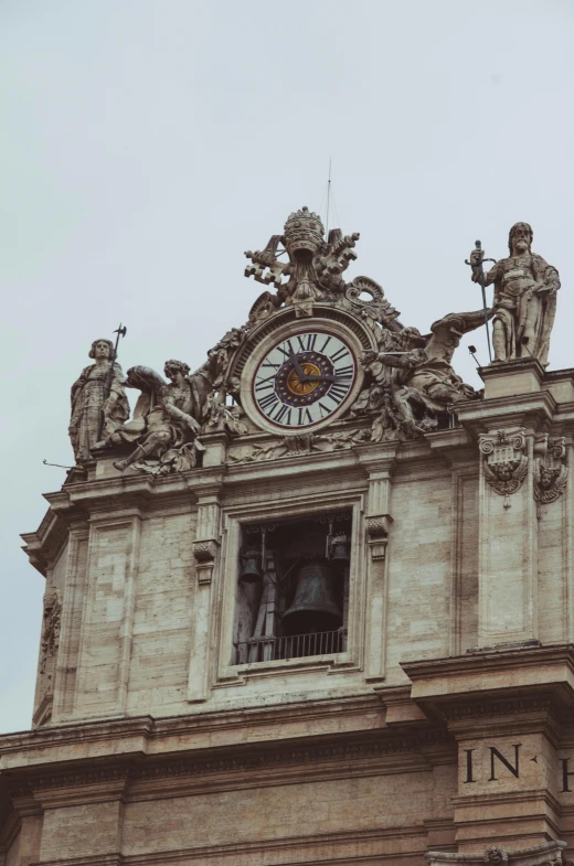 an elaborately decorated building with a clock on top