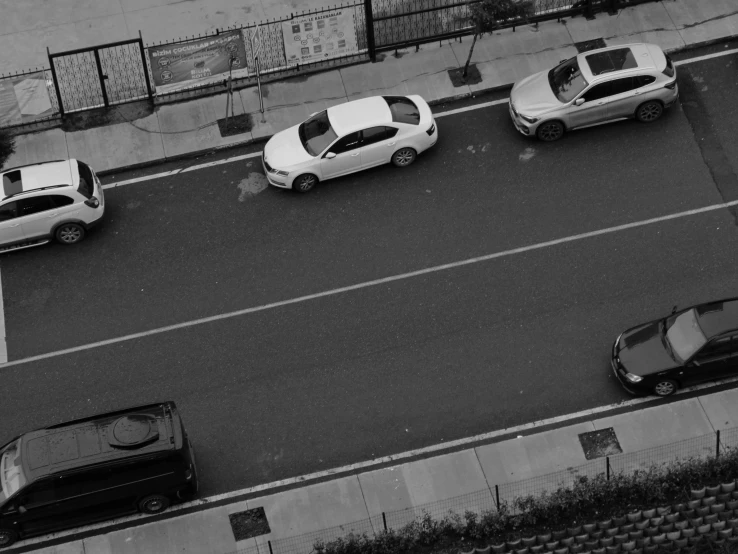 a street with cars parked in various lanes