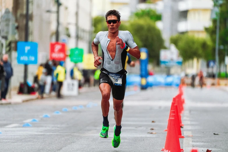 a man running a race in the street