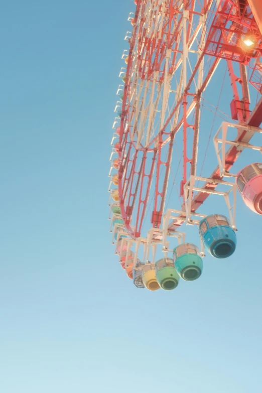 the ferris wheel on a fair is a symbol of fun