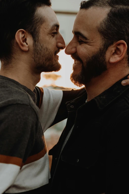 two men who are talking to each other