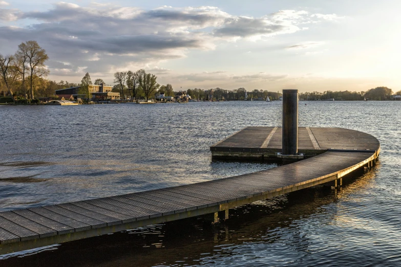 a dock sitting on the side of a body of water