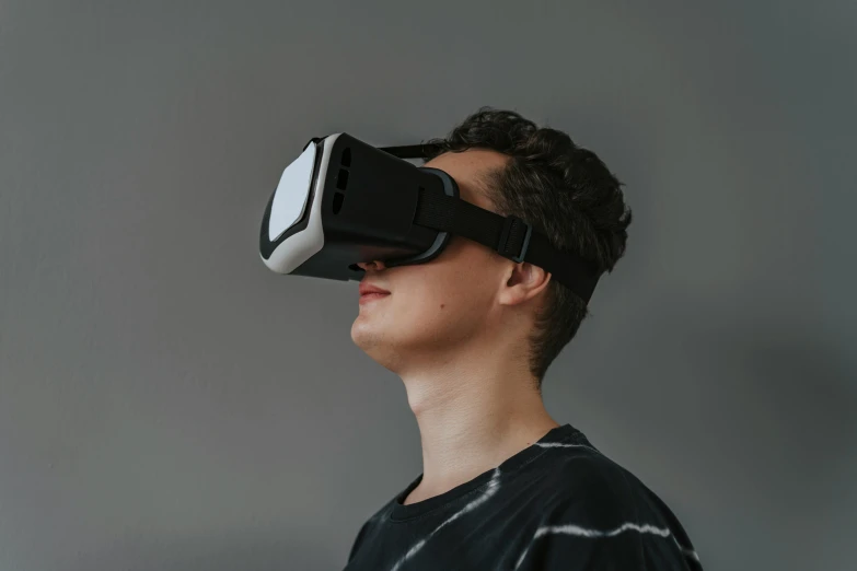 a young man wearing a pair of virtual glasses