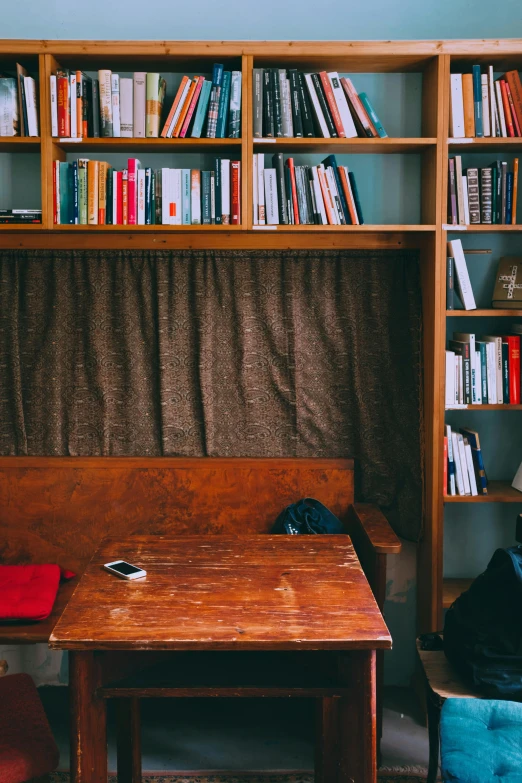 some books are lined up in a room