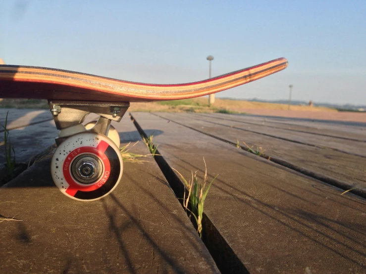 a close up image of a skateboard on the ground