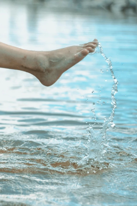 water gushing from the back end of someones foot