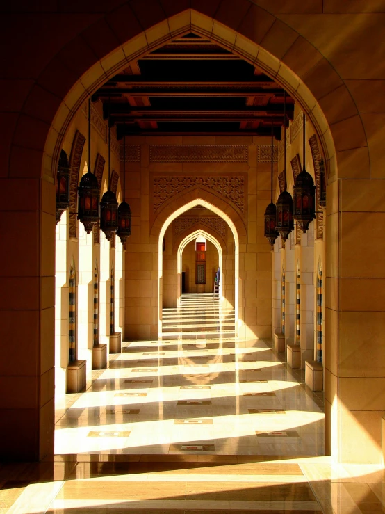 sun shining through the shadows onto a hallway