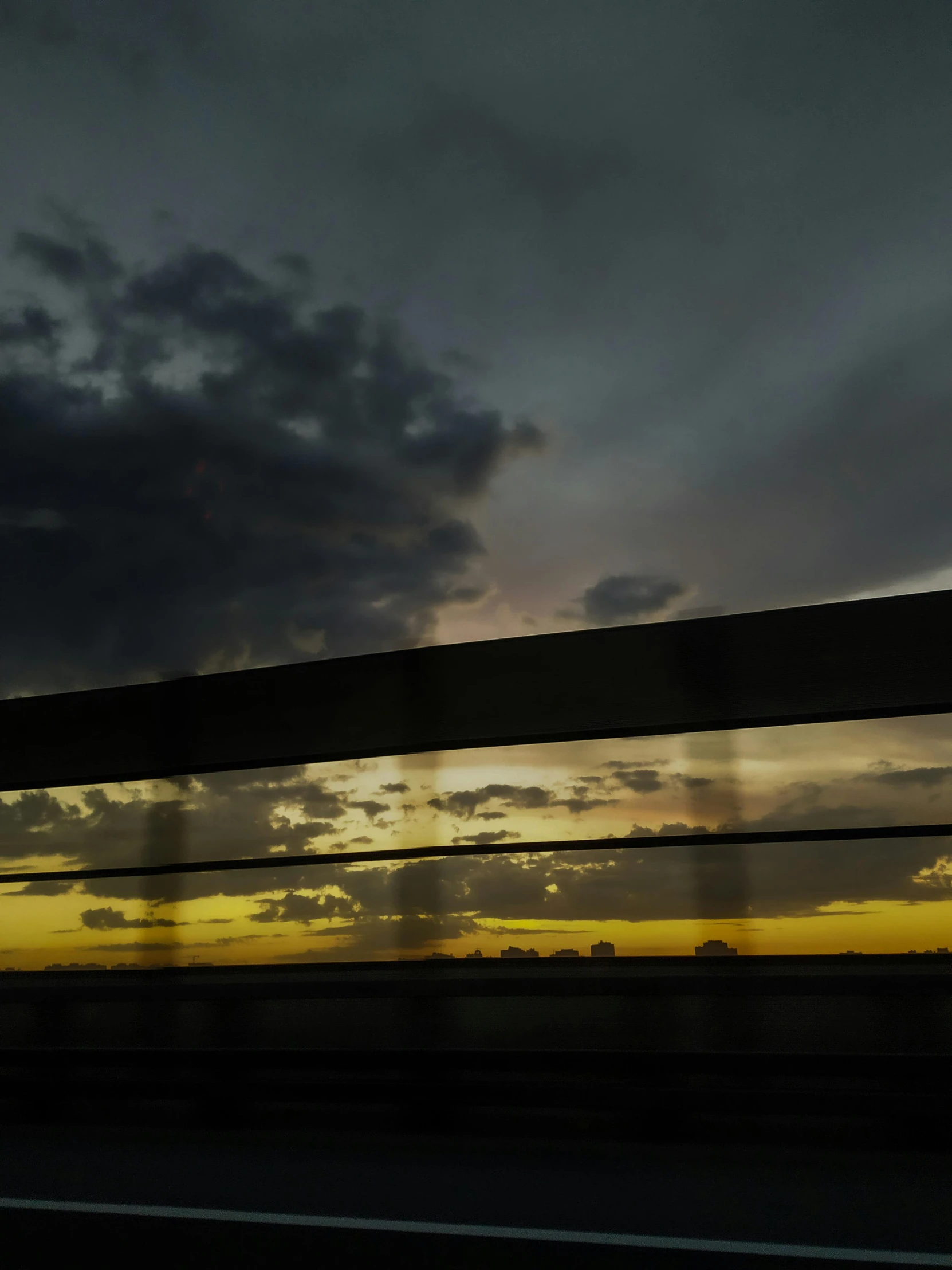 a person riding on top of a wooden bridge