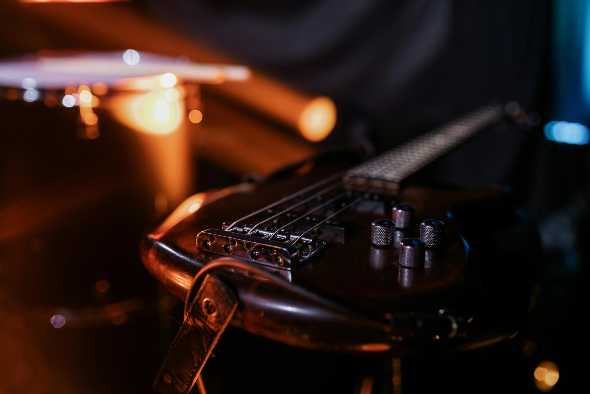 a close up view of a guitar on a chair