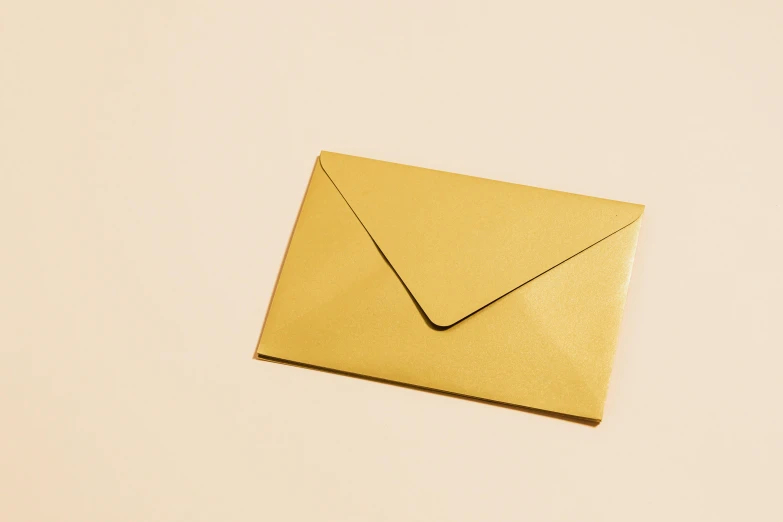 a yellow envelope sits on a white background