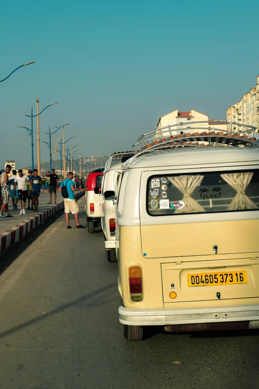 a bunch of vehicles that are on the road