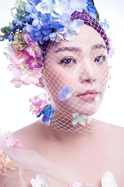 an image of a woman in the image with flowers in her hair