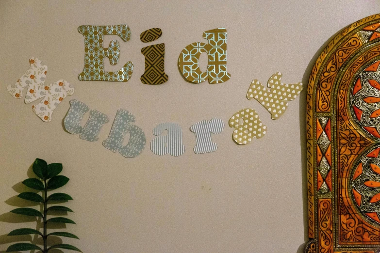 decorative words are spelled with patterned tiles and other shapes
