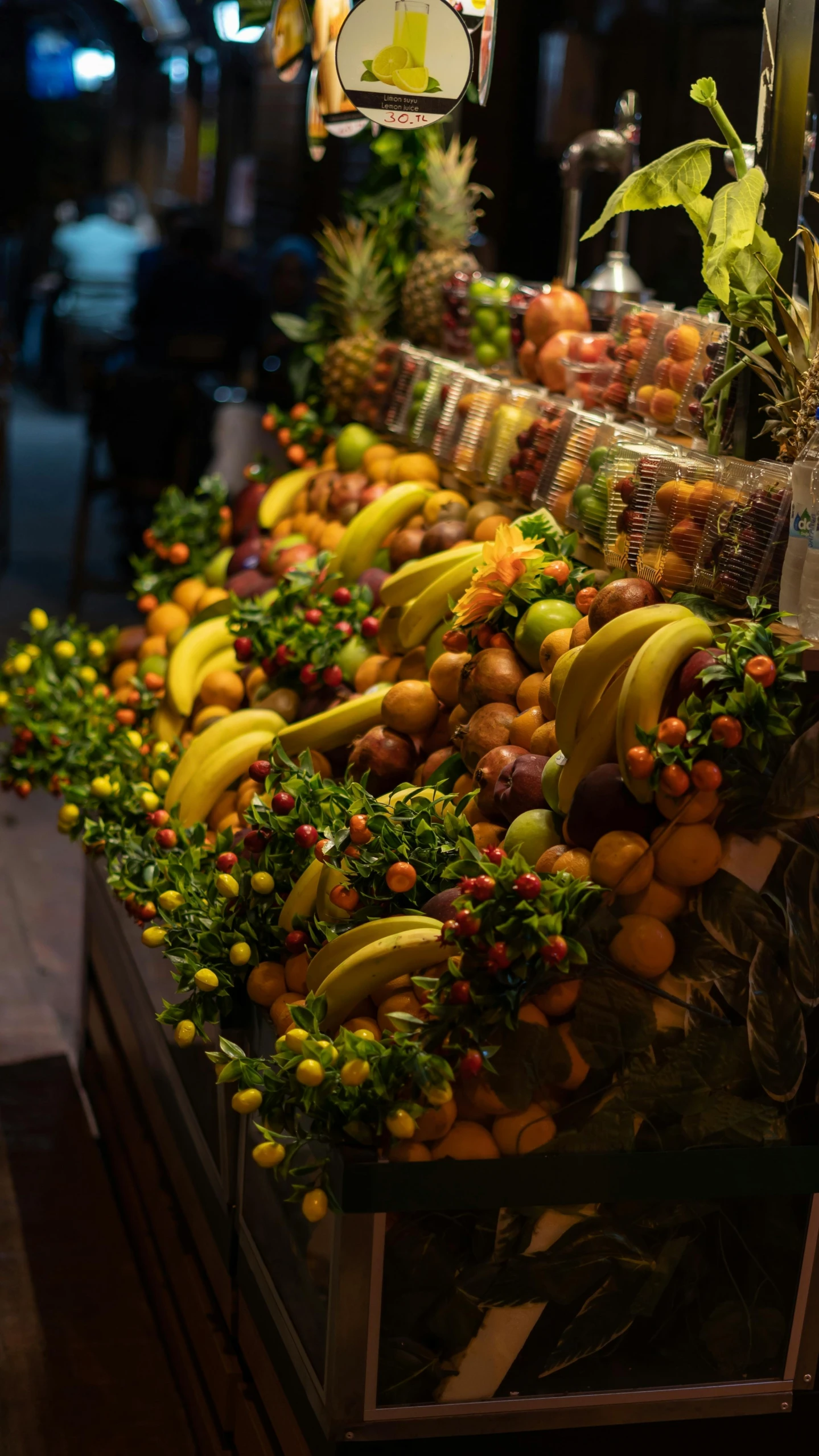 this display features a lot of fresh fruit, including bananas