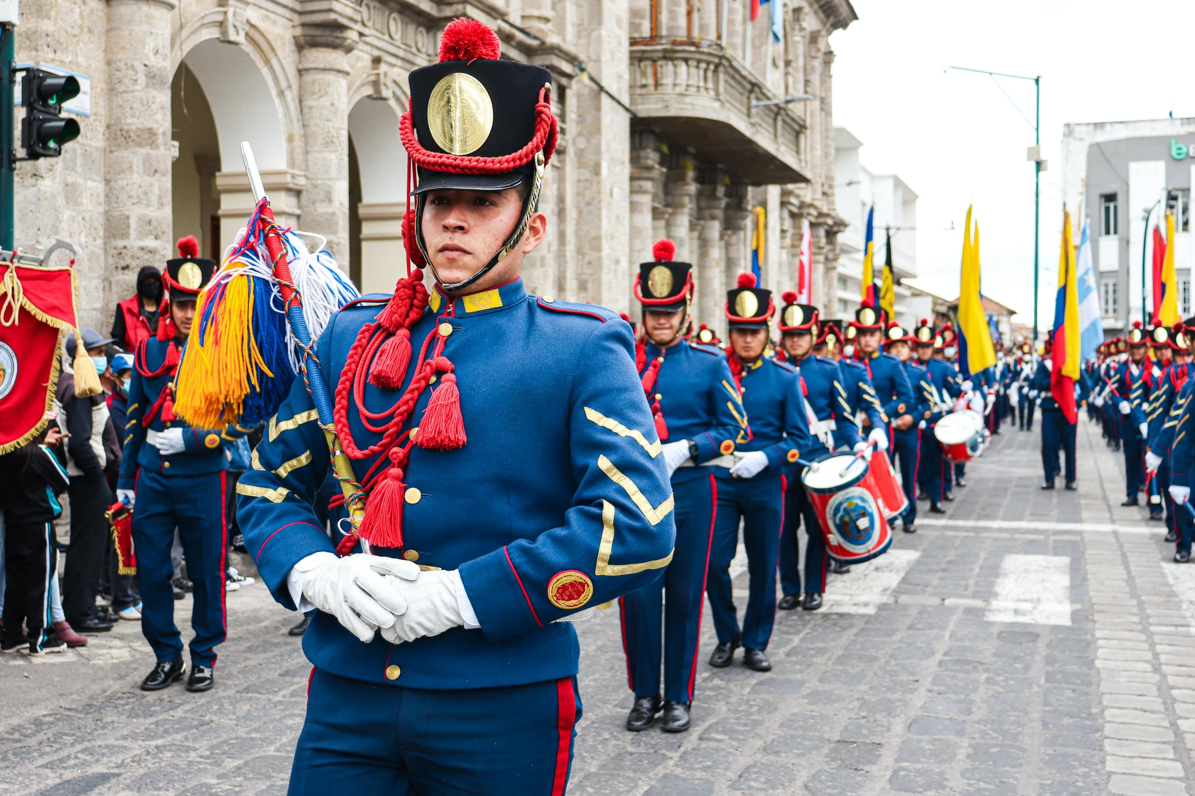 a line of men dressed in military uniforms