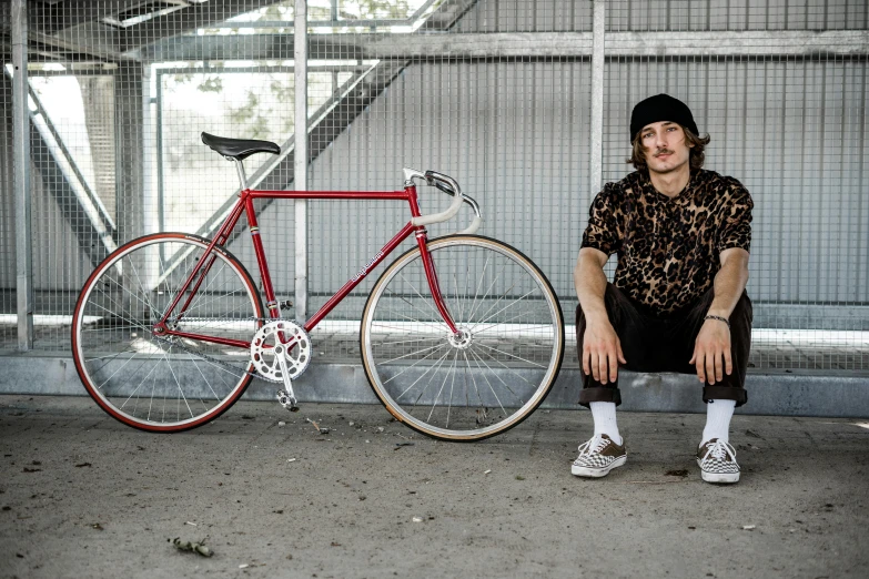 there is a red bicycle next to a white bike