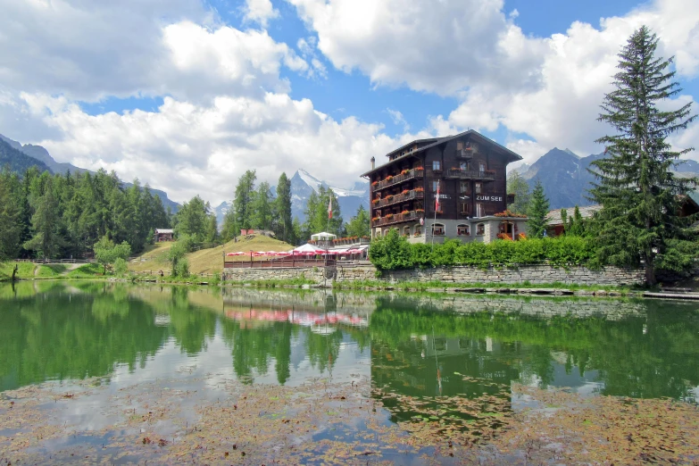 a mountain lake surrounded by a small town