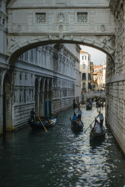 a bridge going over a river that is filled with water