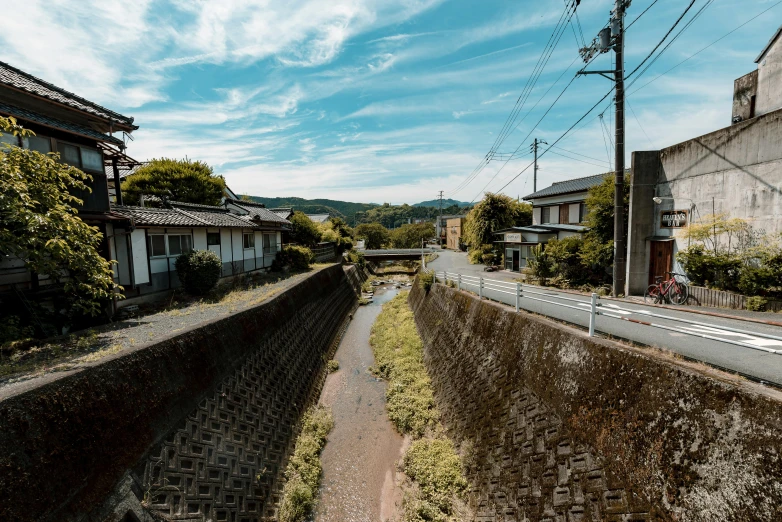 the train tracks run along this old town with no traffic