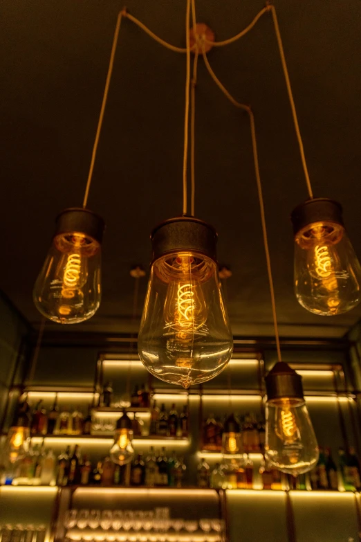 some glass jars that are hanging on the ceiling