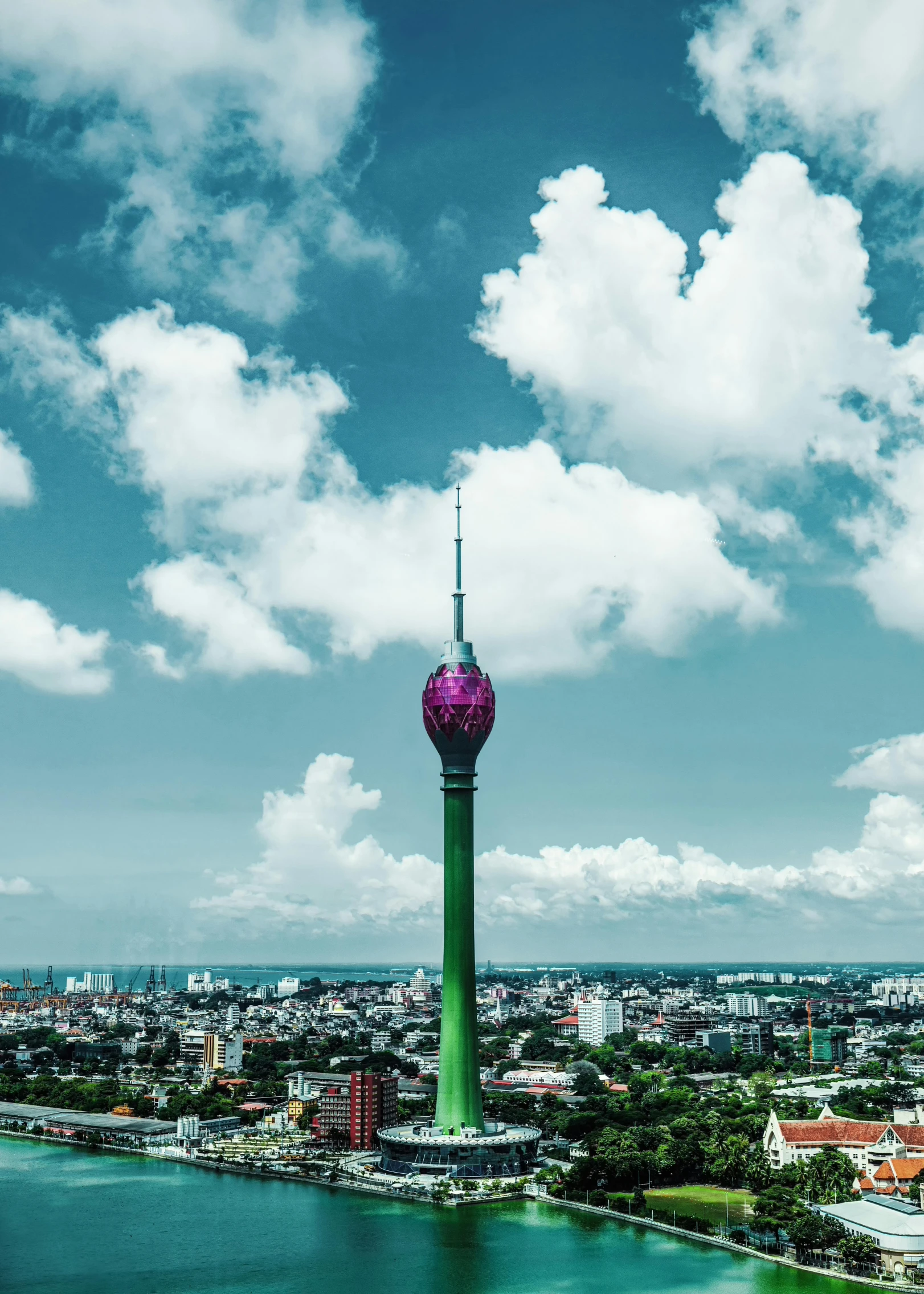 a view of a large body of water with a tower in the center