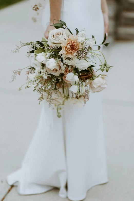 a bridal holding flowers on a wedding day