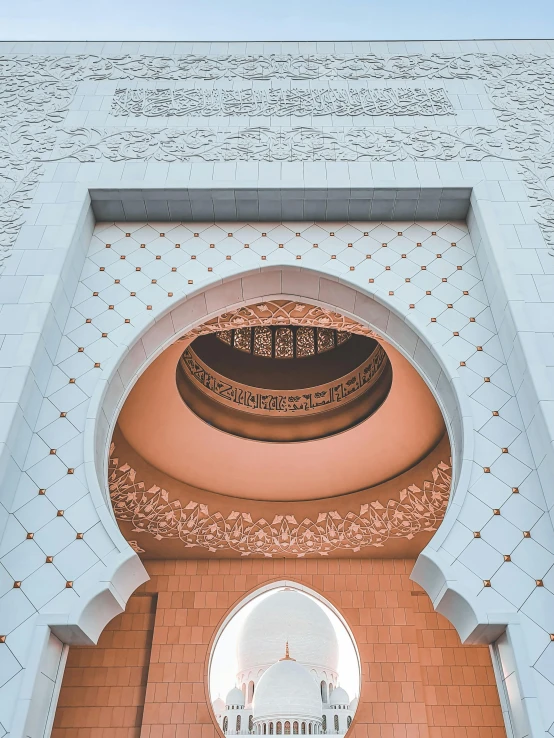 a very tall brick archway with a large dome