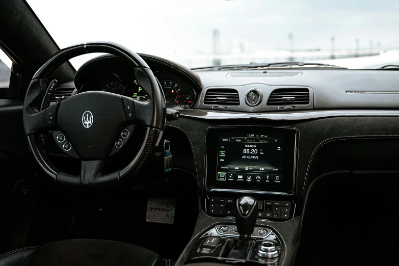 the front dashboard of a car is shown