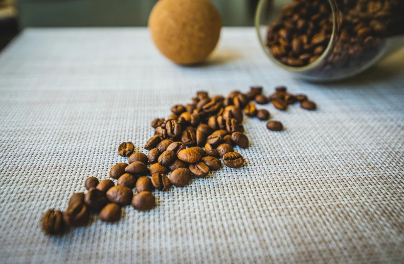 a few roasted almonds on top of a table