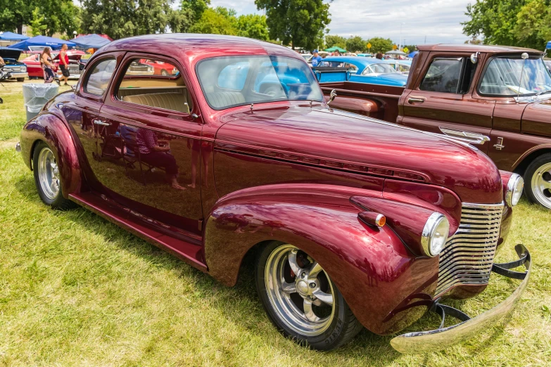 a row of antique cars are on display