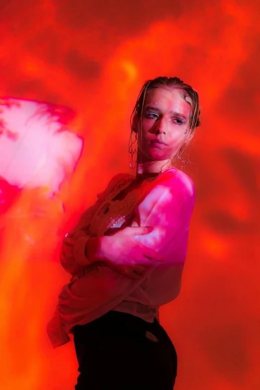 a woman wearing pink lights poses for the camera