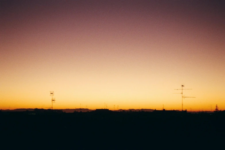 a hazy po with some radio towers in the background