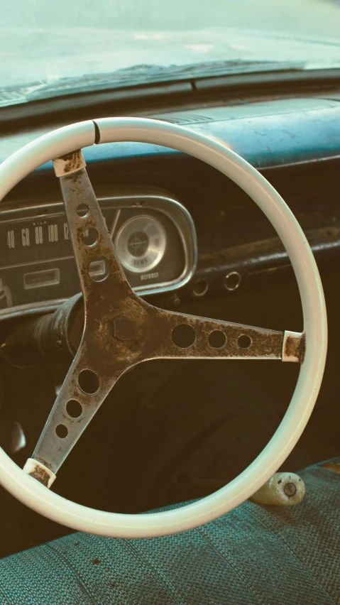 this steering wheel is in the dashboard and has been painted green