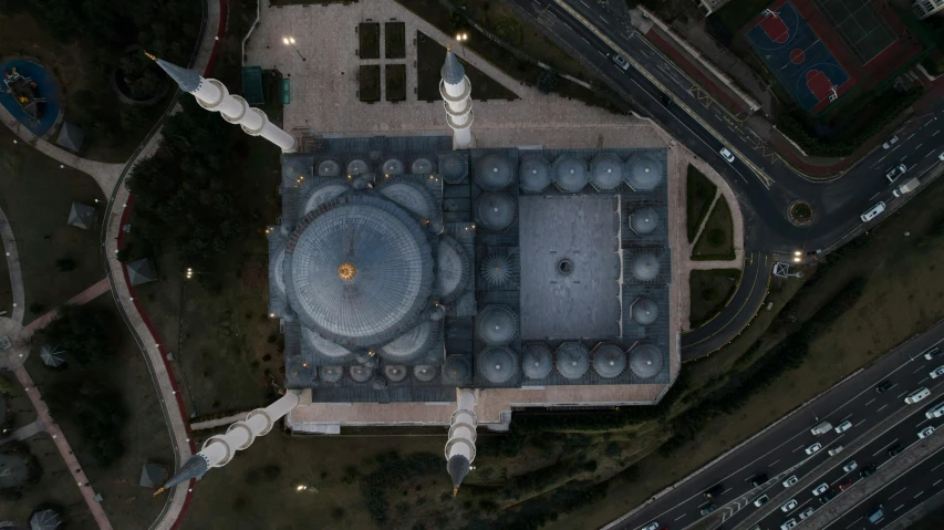 an aerial view of a square surrounded by tall buildings