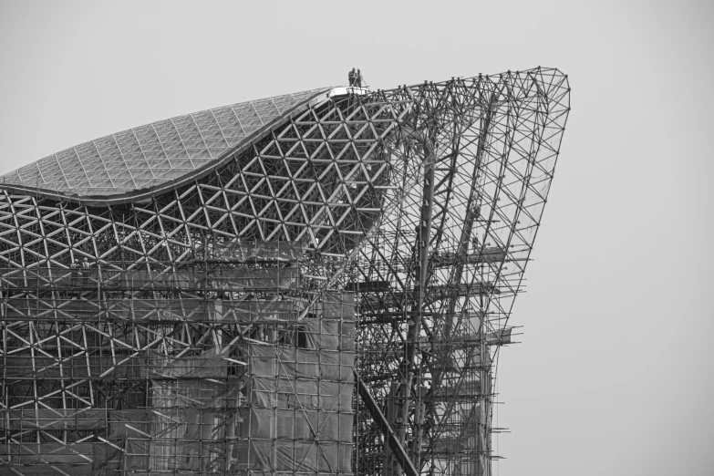 scaffolding around the building to protect the air