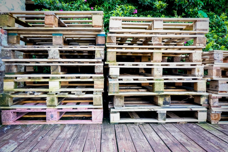 two wooden crates sitting on top of a wooden floor