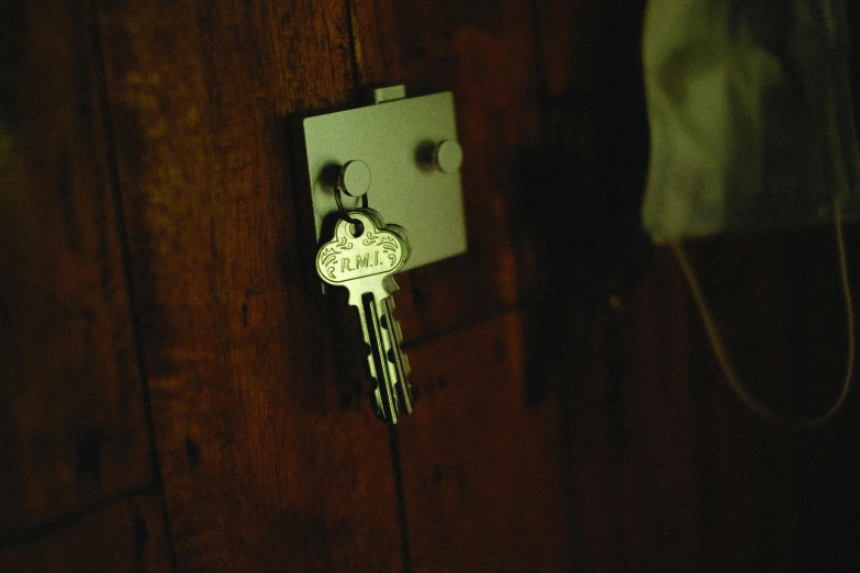 an old fashioned phone with key that is hooked up