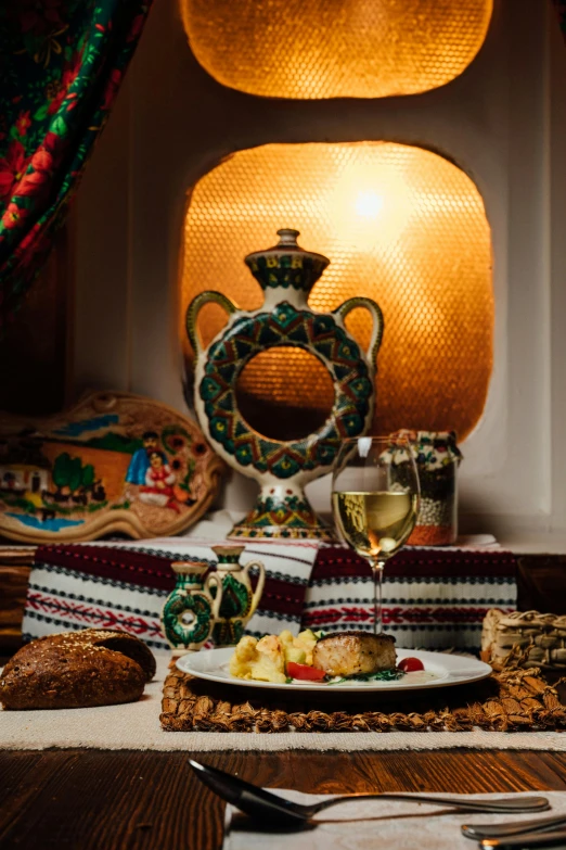 a fancy table setting with dishes and utensils