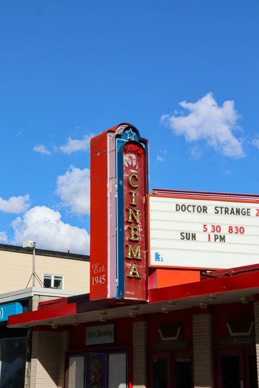 the cinema company is on a street corner