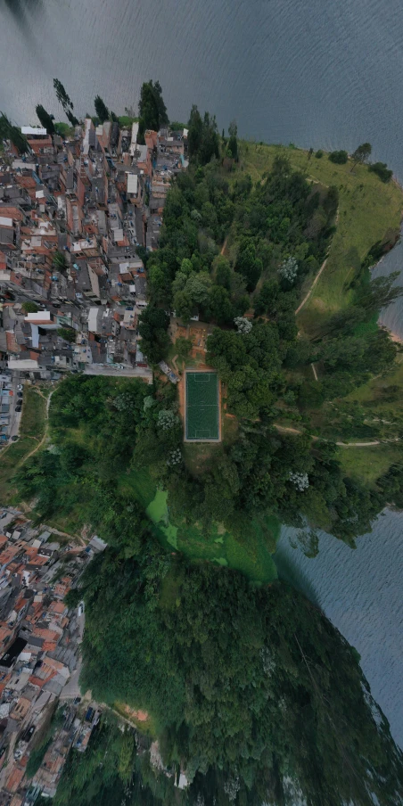 an aerial view of a small town in the water