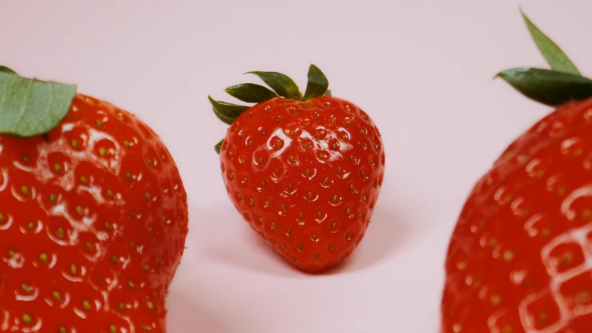the two strawberrys are all different color combinations