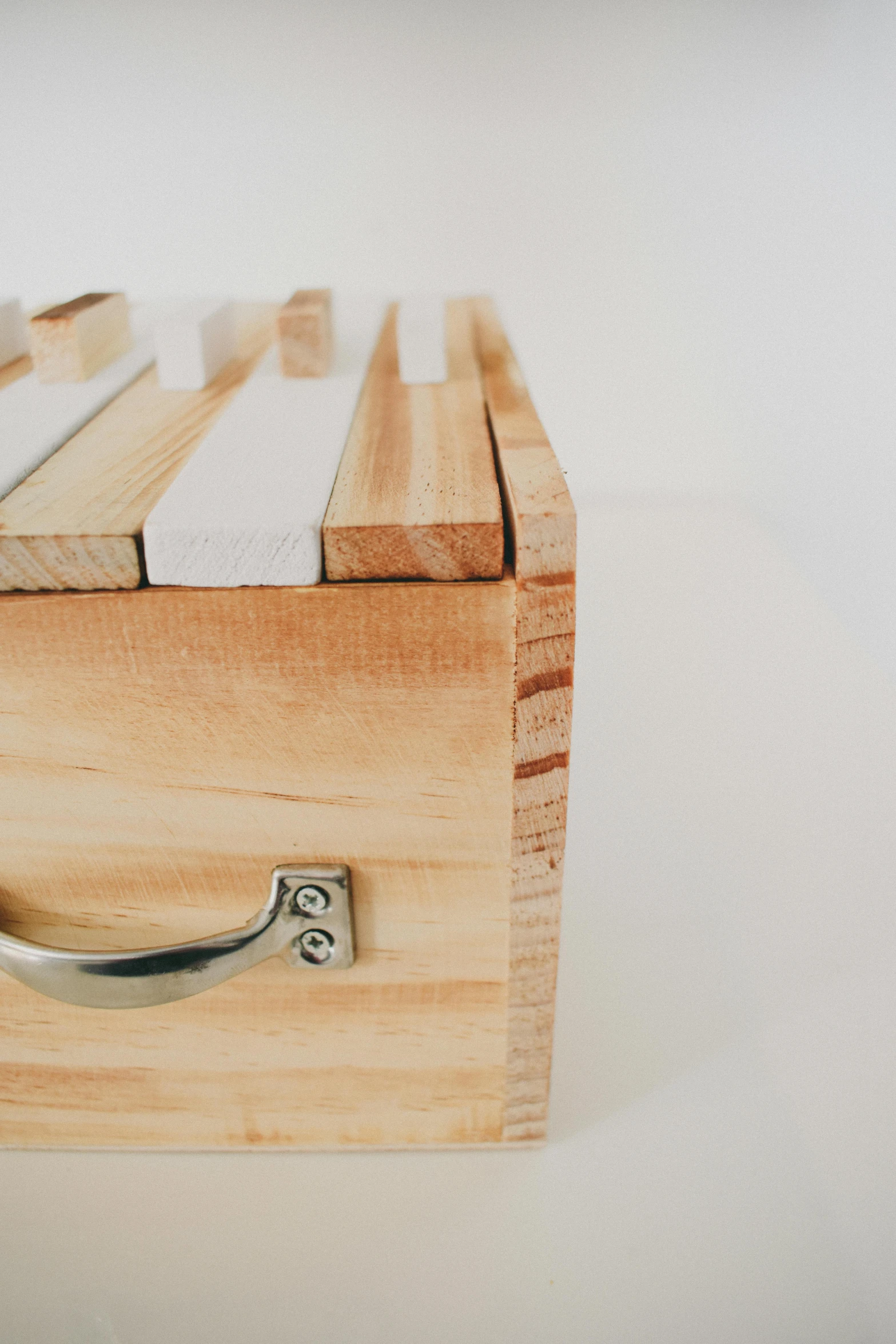 a wooden box with two compartments on top