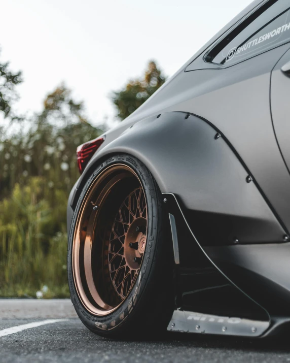 the rims and tires of a sports car