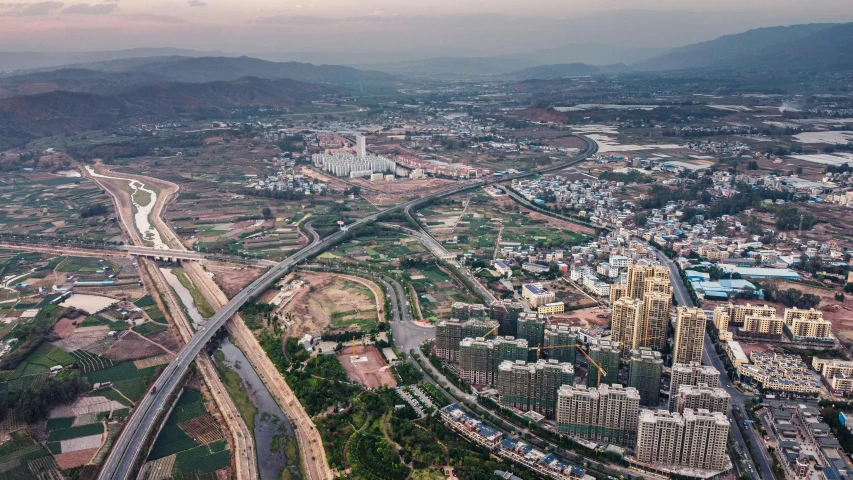 an aerial s of the city with some roads running through it