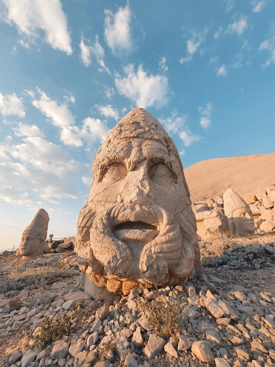 an odd rock formation with a face in the center