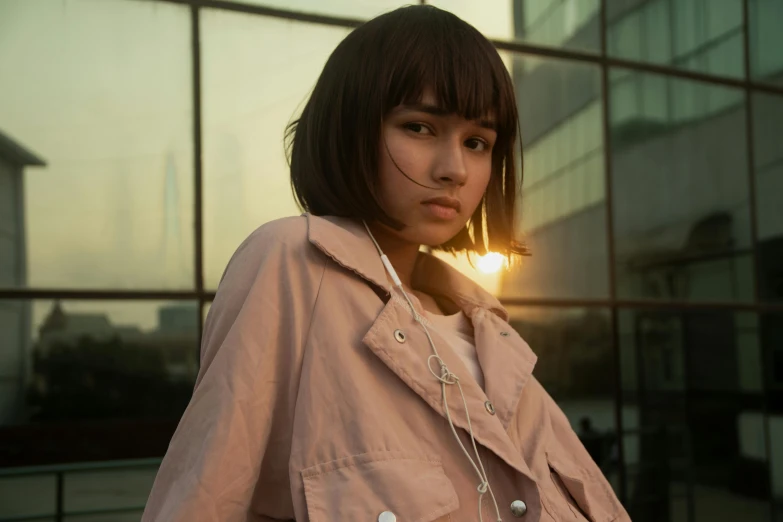 a woman is looking up while standing outside